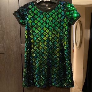 Green sequin girls dress size 8 purchased  from Bloomingdales.